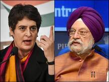 एक बार फिर बोतल से बाहर आया बंगला विवाद का जिन्न, ट्विटर पर भिड़े प्रियंका और हरदीप पुरी