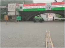 तस्वीरें: Delhi-NCR में राहत के साथ आफत लेकर आई बारिश, सड़कें बनीं तालाब, 15 फीट पानी में डूबी बस