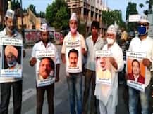 गोरखपुर: 'आप' कार्यकर्ताओं ने दुराचार के आरोपी भाजपा नेताओं के पोस्‍टर चौराहों पर किए चस्‍पा