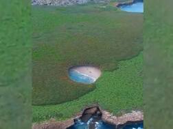 Playa del Amor : वायरल वीडियो में दिखा टापू में छिपा हुआ बीच, पानी की सुरंग में तैर कर पहुंचा जाता है यहां