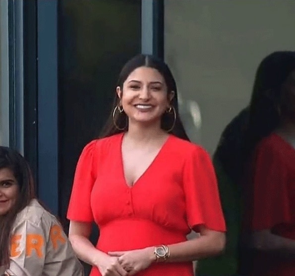 Anushka sharma flaunts baby bump in red dress in stadium to cheer up RCB in IPL photo viral