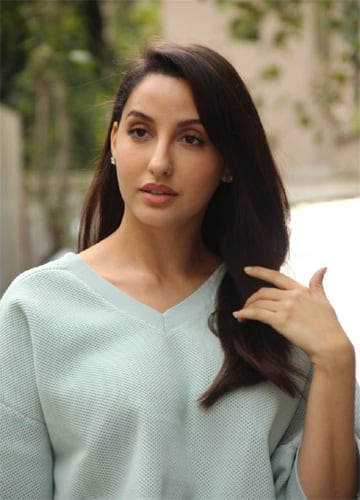 नोरा के स्ट्रगल की कहानी तो बचपन में ही शुरु हो गई थी. दरअसल, नोरा का जो पैशन था उसके खिलाफ उनके परिवारवाले ही थे. उन्हें नोरा का डांस करना कभी भी पसंद नहीं था. (Photo Credit - Instagram)