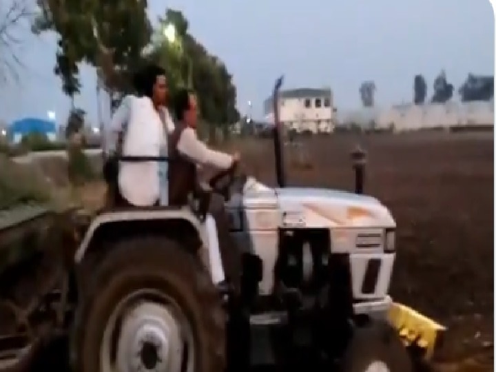 Madhya Pradesh CM Shivraj Singh seen as a farmer, shared a video of farming मध्य प्रदेश के CM शिवराज सिंह का ट्रैक्टर से खेत जोतते वीडियो वायरल, यहां देखिए