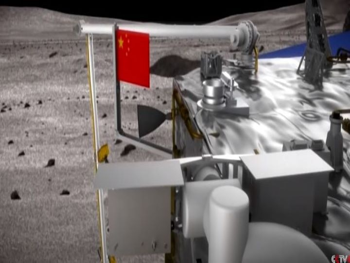 China's Chang E-5 vehicle hoists the national flag on the lunar surface, CNSA released first photo चीन के चांग ई-5 यान ने चांद की सतह पर फहराया नेशनल फ्लैग, CNSA ने जारी की पहली तस्वीर