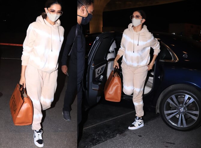 Deepika Padukone in a Louis Vuitton sweatsuit airport-style