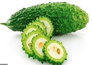 Karela juice benefits bitter gourd will take care of eyes in winter try  this method once | Karela Juice Benefits: શિયાળામાં કારેલાનું જ્યુસ, આંખોની  હેલ્થ માટે છે ઔષધ સમાન, આ રીતે કરો