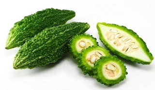 Bitter Gourd Health Benefits And Relief In Headache Good For Bones | स्वाद  में कड़वा करेला शरीर के लिए है वरदान, जानिए करेला खाने के फायदे