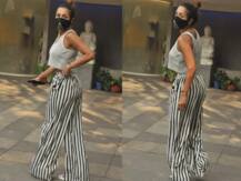 शॉर्ट टॉप और व्हाइट एंड ब्लैक लूज़ लॉन्ग लोअर में इस बार नहीं जचीं Malaika Arora, खुद भी नहीं थीं कन्फर्टेबल