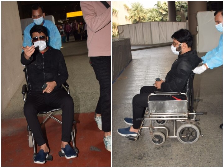 Kapil Sharma sitting on wheelchair lost his temper after seeing paparazzi, saying abusive, video getting viral व्हीलचेअर पर बैठे Kapil Sharma ने कैमरा देखकर खोया आपा, कहे अपशब्द,  Video वायरल