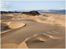 दुनिया को रेत का संकट: कोविड वैक्सीन के लिए कांच की शीशियां बनाना नहीं होगा आसान, जानें वजह