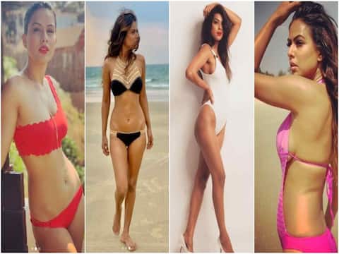 In Pics: जब Nia Sharma ने बिकिनी लुक में इंटरनेट पर मचाया तहलका In Pics: जब Nia Sharma ने बिकिनी लुक में इंटरनेट पर मचाया तहलका