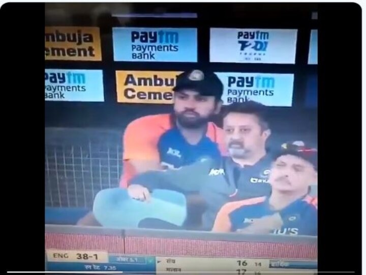 Rohit Sharma was eating food while hiding on the bench, trolls on internet मैच के दौरान रोहित शर्मा ने छिपकर किया कुछ ऐसा कि सोशल मीडिया पर जमकर हुए ट्रोल