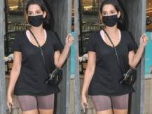 प्लेन ब्लैक टॉप और शॉर्ट्स में भी ढाया Nora Fatehi ने कहर, सिंपल लुक को इन चीज़ों से बना दिया खास