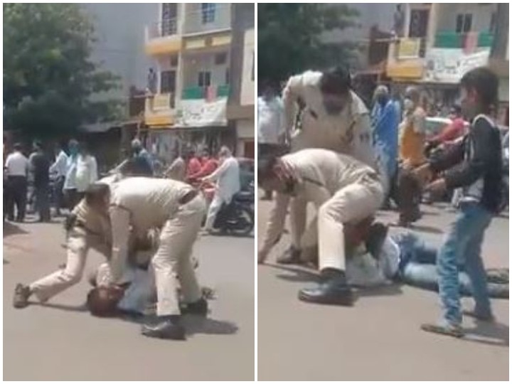 Viral Video in indore son was begging for mercy but police kept beating him for not wearing mask Viral Video: 'मेरे पापा को मत मारो', बेटे मांग रहा था रहम की भीख लेकिन मानी पुलिस, मास्क नहीं पहनने पर जमकर पीटा