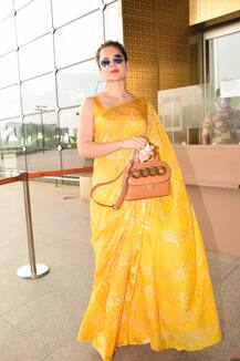 ट्रोल होने के बाद आज एयरपोर्ट पर मास्क लगाए दिखीं Kangana Ranaut, पीली साड़ी में दिखाया Killer अंदाज