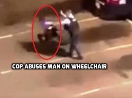 Police Officer Thrashed A Physically Challenged Man From Wheelchair হুইল চেয়ারে বসা প্রতিবন্ধী যুবককে ধাক্কা মেরে রাস্তায় ফেলে দিলেন পুলিশ, দেখুন ভিডিওতে