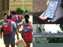 পড়ুয়াদের হাতে ফোন, স্কুলের সিদ্ধান্ত ঘিরে বিতর্ক