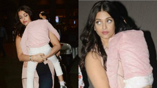 Aishwarya Rai Bachchan Carrying Sleeping Daughter Aaradhya In Her Arms দেখুন! ঘুমন্ত মেয়েকে কোলে তুলে হাঁটছেন ঐশ্বর্যা!