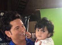 সচিনের কোলে এই শিশু কে ?