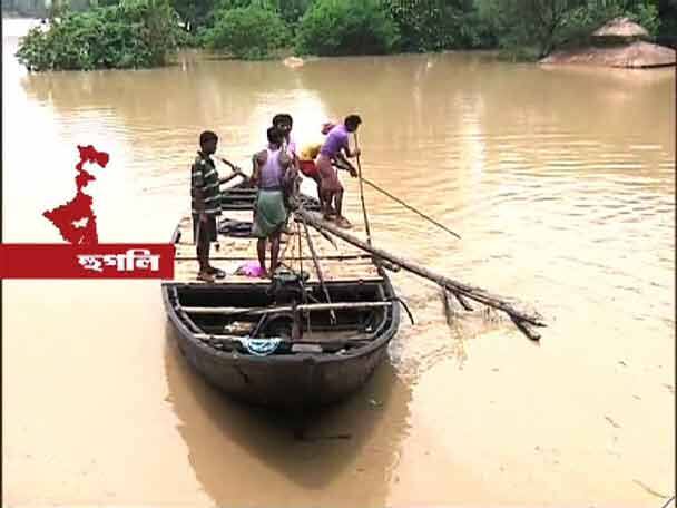 ডিভিসি জল ছাড়ায় জারি লাল সতর্কতা। জল ছাড়ায় ২০০৯-এর পর রেকর্ড, কটাক্ষ সেচমন্ত্রীর। আরামবাগে বাঁধ ভাঙায় বিপত্তি। জলমগ্ন রাজ্যের একাধিক জেলা। 