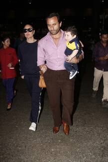 বাবার কোলে চড়ে সুইজারল্যান্ড থেকে ঘরে ফিরল ছোট্ট তৈমুর