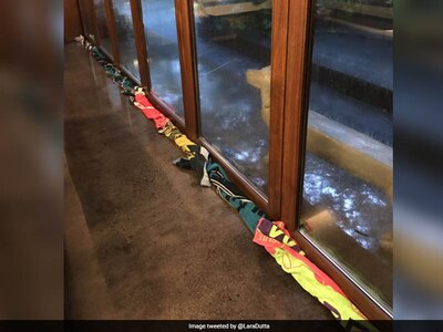 Heres How Lara Dutta Bhupati Is Using Husband Mahesh Bhupatis Grand Slam Towels In Mumbai Rain বৃষ্টির জল ঠেকাতে গ্র্যান্ডস্লামের তোয়ালে! লারার ওপর বেজায় চোটেছেন মহেশ ভূপতি