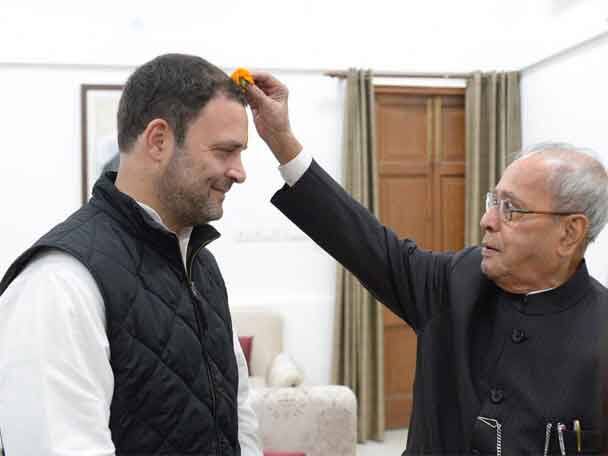 Rahul Gandhi files nomination for Congress chief কপালে হাত রেখে আশীর্বাদ প্রণবের ,কংগ্রেস সভাপতি পদে মনোনয়ন পেশ, দলের মহান ঐতিহ্য এগিয়ে নিয়ে যাবেন রাহুল, বললেন মনমোহন