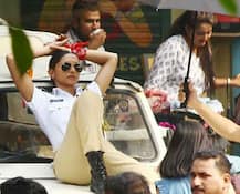 দেখুন তো রাস্তার ধারে গাড়ির ওপর বসে এই রাউডি ট্র্যাফিক পুলিশকে আপনি চেনেন কি