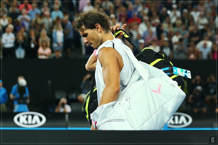 Injured Nadal retires from Australian Open চোটের কারণে অস্ট্রেলিয়ান ওপেন থেকে বিদায় নাদালের