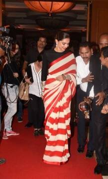 দেখুন লাল সাদা শাড়িতে দীপিকাকে