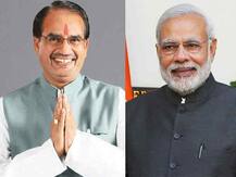 মধ্যপ্রদেশে প্রধানমন্ত্রী আবাস যোজনায় গরিবের জন্য বাড়ির দরজা, রান্নাঘরে বসবে মোদী, শিবরাজের ছবি দেওয়া টাইলস, বিতর্ক