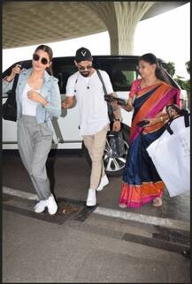 দেখুন! মুম্বই বিমানবন্দরে হাতে হাত বিরাট-অনুষ্কা