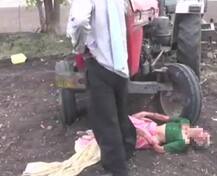 জমি মামলায় হার, জয়ী পক্ষের চাষ আবাদ রুখতে মাকে ট্রাক্টরের সামনে ফেলল ছেলে