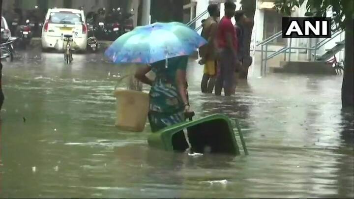  প্রায় এক কোমর জলের নীচে গুজরাতের বিভিন্ন শহর