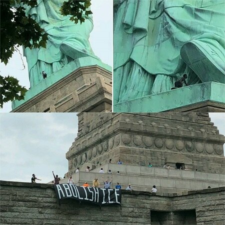 Woman climbs base of Statue of Liberty to protest Trump's immigration policy ট্রাম্পের অভিবাসন নীতির প্রতিবাদে স্ট্যাচু অফ লিবার্টির পাদভূমিতে উঠে বসলেন এক মহিলা