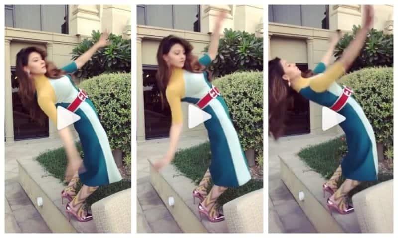 Urvashi rautela video getting imbalance during photo shoot from wall দেখুন: হাই হিল পায়ে সংকীর্ণ দেওয়ালের উপর দাঁড়িয়ে ফটোশ্যুট করতে গিয়ে ভারসাম্য হারালেন ঊর্বশী রউতেলা