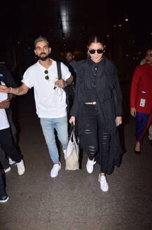 বিমানবন্দরে বিরুষ্কা, একে অপরে মগ্ন তাঁরা, দেখুন ভাইরাল হওয়া ছবি