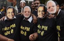 দেখুন, মোদী-অম্বানির মুখোশ নিয়ে রাফাল দুর্নীতির অভিযোগে কংগ্রেসের বিক্ষোভ