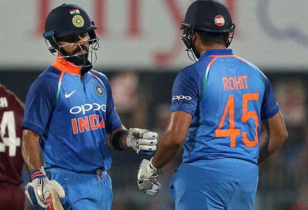 Rohit, Kohli tons ensure easy eight-wicket win for India in 1st ODI কোহলি, রোহিতের জোড়া দুরন্ত শতরান, প্রথম একদিনের ম্যাচে ওয়েস্ট ইন্ডিজকে ৮ উইকেটে হারাল ভারত
