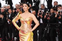 দেখুন! সোনালি গাউনে কানের লাল কার্পেট মাতালেন ঐশ্বর্যা