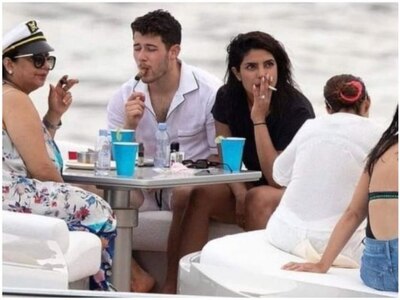 Priyanka Chopra gets brutally trolled by netizens for smoking দীপাবলীর সময় বাজি না পোড়াতে উপদেশ দিয়েছিলেন, আর এবার নিজেই সিগারেট ফুঁকে সোশ্যাল মিডিয়ায় ট্রোলড প্রিয়ঙ্কা চোপড়া