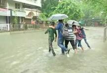 মুম্বইয়ে প্রবল বৃষ্টি, জলমগ্ন রাস্তা, রেললাইন, সমস্যায় মানুষ