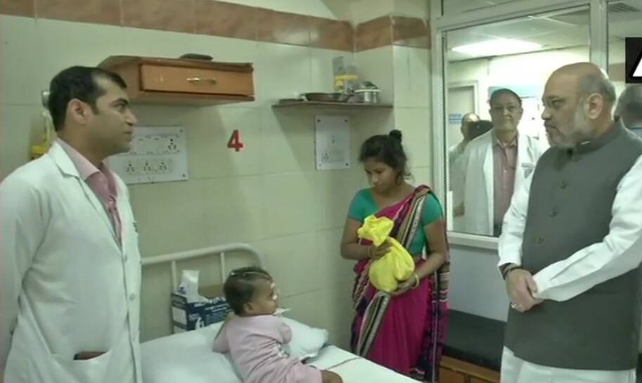 BJP President Amit Shah at AIIMS for Seva Sapath প্রধানমন্ত্রীর জন্মদিন উপলক্ষ্যে বিজেপির 'সেবা শপথ', আজ এইমসে শিশুদের ফল দিলেন অমিত, নড্ডা