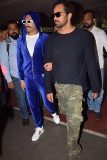 ছবিতে দেখুন: বিমানবন্দরে হাত বাড়িয়ে দিলেন রণবীর সিংহ, কিছুতেই ধরল না এই শিশু!