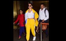 অসুস্থতা কাটিয়ে ঝলমলে হলুদ পোশাকে এয়ারপোর্টে দীপিকা পাড়ুকোন