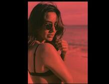 দেখুন, সমুদ্রতীরে সাহসী পোশাকে ছুটি কাটাচ্ছেন অভিনেত্রী নেহা শর্মা, ভাইরাল ছবি