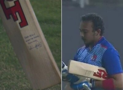 Kohlis message and autograph on Prithvi Shaws bat delight netizens পৃথ্বী শ-র ব্যাটে বিরাটের সই ও বার্তা!