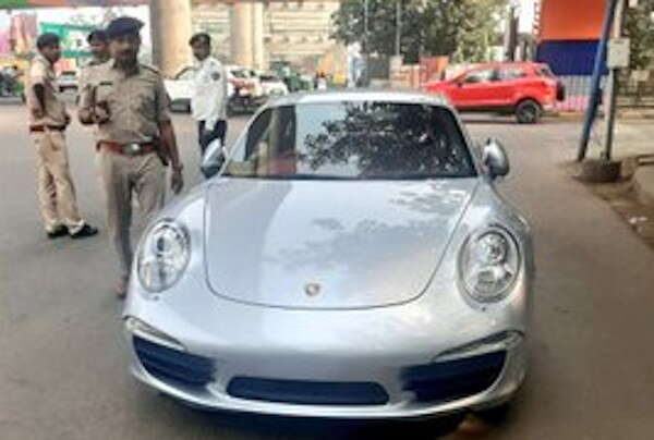 Gujarat Porsche 911 Owner Pays Rs 27.68 Lakh To Get Back His Impounded Car দেশের মধ্যে 'সর্বোচ্চ' ২৭.৬৮ লক্ষ টাকা জরিমানা দিয়ে বাজেয়াপ্ত পোর্শে ছাড়ালেন গুজরাতের ব্যক্তি