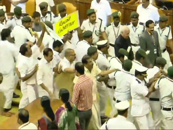 High Drama Unfolds In Kerala Assembly As Opposition MLAs Protest Against Governor Arif Mohammed Khan এবার কেরল বিধানসভায় রাজ্যপালকে ‘গো ব্যাক’ স্লোগান বিরোধী বিধায়কদের