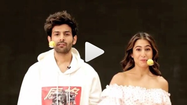 viral-dance-of-sara-ali-khan-and-kartik-aaryan ভিডিওয় দেখুন, মুখে চামচ-পাতিলেবু নিয়ে ব্যালেন্সের খেলা দেখাতে শুরু করলেন সারা-কার্তিক!